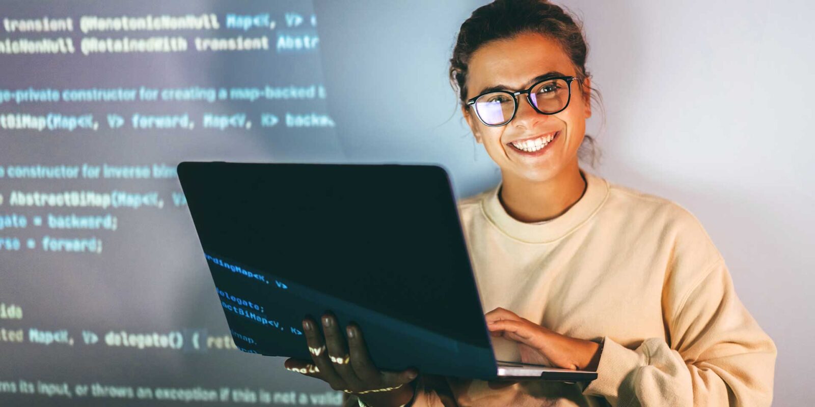 gld_foundation_computer_science_lp woman working on computer science on a laptop